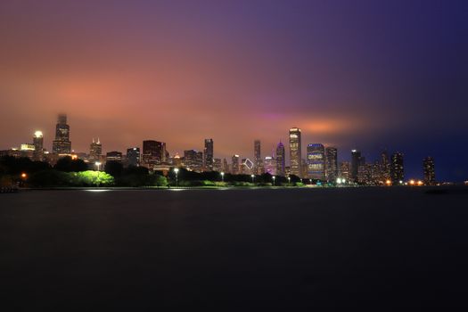 Chicago, Illinois, USA - June 22, 2018 - The Chicago skyline at night after a storm across Lake Michigan.