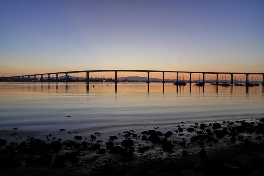 The Sunrise over the Coronado Bridge in San Diego, California.