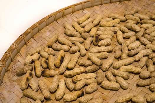 Fried and Dried Peanuts in a Bamboo Tray