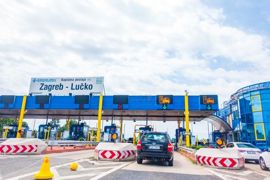 Highway A1 near Zagreb, Croatia, July 1 2018: Highway toll station Lucko in Zagreb, Croatia during holiday season is reason for long congestions on main Croatian highway in summer