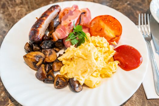 Full English Breakfast on Table with coffee