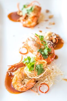 Fried tiger prawn grilled shrimp with tamarind sauce, gourmet Thai cuisine.