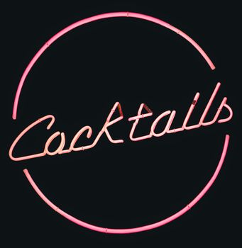 Isolated Retro Pink Neon Cocktails Sign With A Black Background