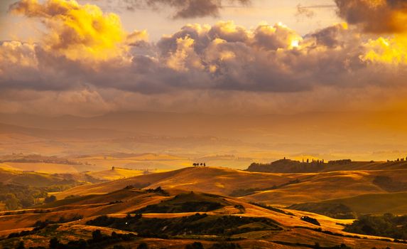 Evening with dramatic cloudscape in Tuscany, Italy.