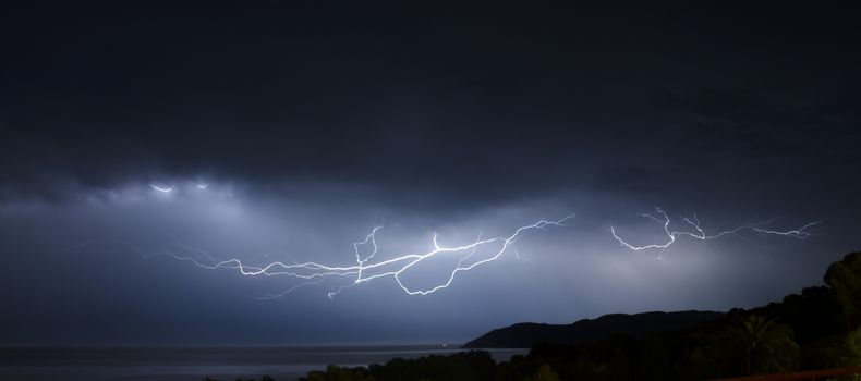 stormy night on the sea with lightning