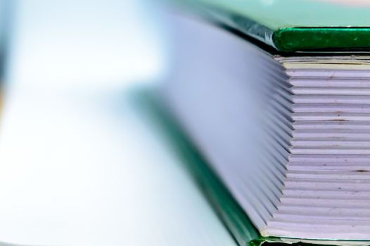 Side view of old book. Old book texture isolated on white background. Side view. Open book isolated soft background.