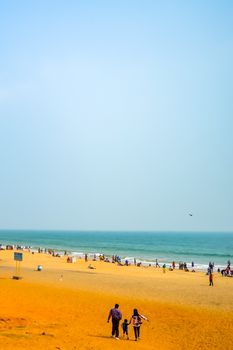 Photograph sea beach Goa India during Christmas Holiday snap in vertical style. Subject is hopeful bright exciting calm beautiful . Useful for background e-cards in website. Travel Vacation Holiday Concept.