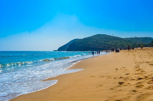 Photograph of Goa Sea Beach taken in Christmas Holiday during New Year celebration in landscape style Use for background screen saver e-cards website banner usage Travel holiday new year celebration