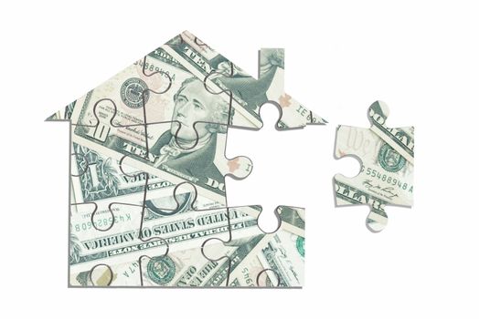 Dollar house jigsaw puzzle over a white background