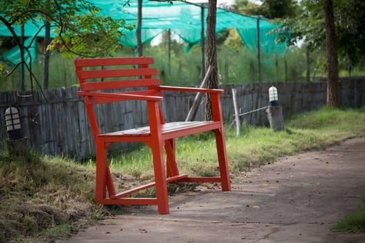 Sit red bench in the park
