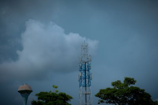 Signal towers and rain clouds are coming.