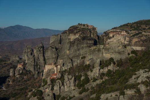 Landscape with monasteries and rock formations in Meteora, Greece.