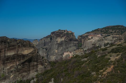 Landscape with monasteries and rock formations in Meteora, Greece.