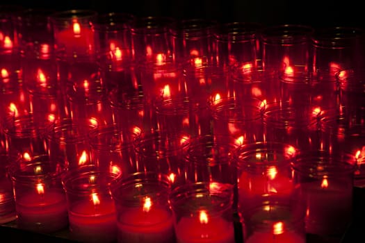 Burning candles in a church, concept of faith