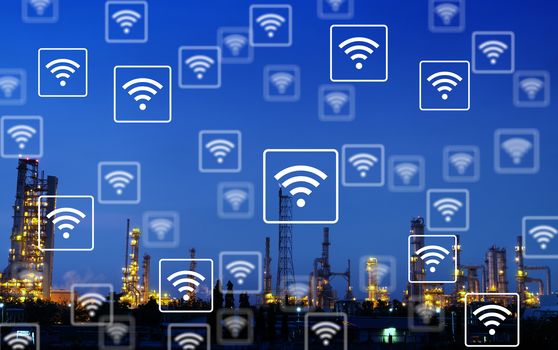 The smart industry 4.0 at morning time. Industry with blue sky. WiFi icon pattern.