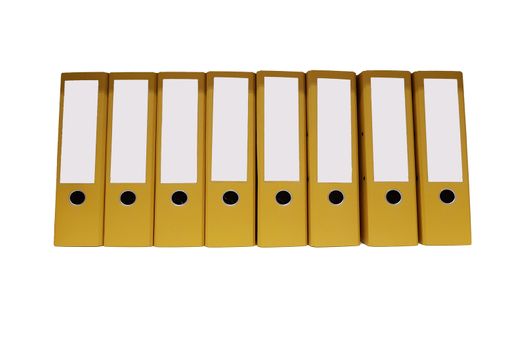 8 yellow file folders or ring binders in a row in front of white background