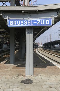 Rail tracks and trains in the Brussels South Railway Station