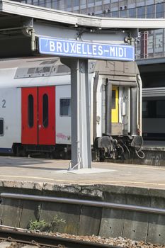 Rail tracks and trains in the Brussels South Railway Station