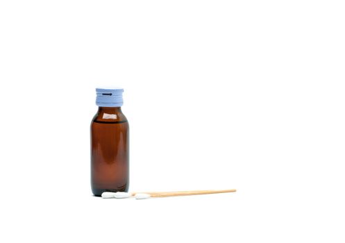 Cotton sticks and antiseptic solutions in amber glass bottle isolated on white background. Concept of Umbilical cord care for helps prevent infection. Infant's umbilical cord cleaning care equipment.