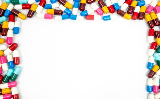 Colorful of antibiotic capsules pills isolated on white background with copy space. Drug resistance concept. Antibiotics drug use with reasonable and global healthcare concept. Pharmacy background. Pharmaceutical industry.
