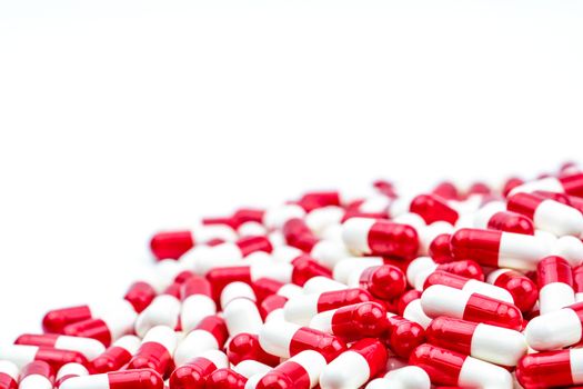 Selective focus of antibiotic capsules pills on white background with copy space. Drug resistance concept. Antibiotics drug use with reasonable and global healthcare concept. Pharmaceutical industry. Pharmacy background.