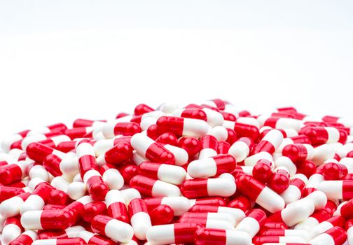 Selective focus of antibiotic capsules pills on blur background with copy space. Drug resistance concept. Antibiotics drug use with reasonable and global healthcare concept. Pharmaceutical industry. Pharmacy background.