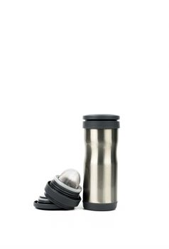 Silver thermos bottle with opened cap isolated on white background with copy space. Beverage container. Coffee and tea bottle.