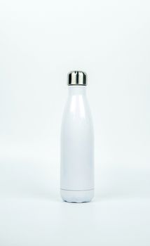 White thermos bottle with sport design on white background with copy space. Beverage container. Coffee and tea bottle.