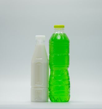 Soft drinks in plastic bottle with modern packaging on white background