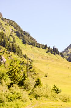 View of a valley and green hills in the Austrian Tyrol