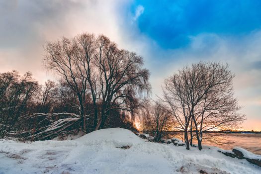 Cold winter snowy landscape at middle of the day