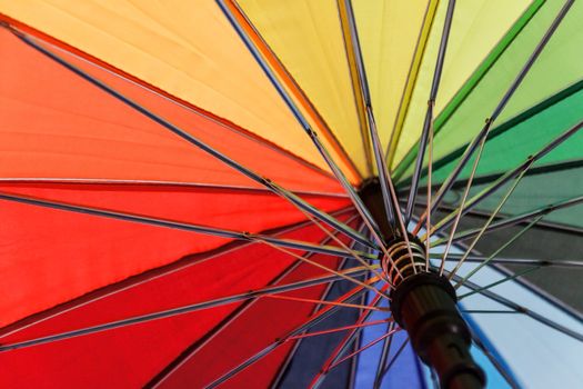 Colorful background. Colorful umbrella close-up.