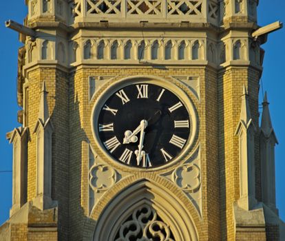 Clock on tower on main catholic cathedral in Novi Sad