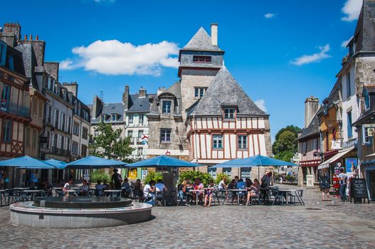 Square with fountain and terrace in the old medieval city center of Quimper