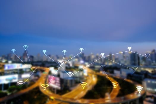 WiFi network on blurred cityscape background. Technology 4.0 concept. The city of connection and big data.