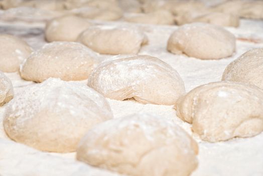 Raw fresh dough in industrial bakery