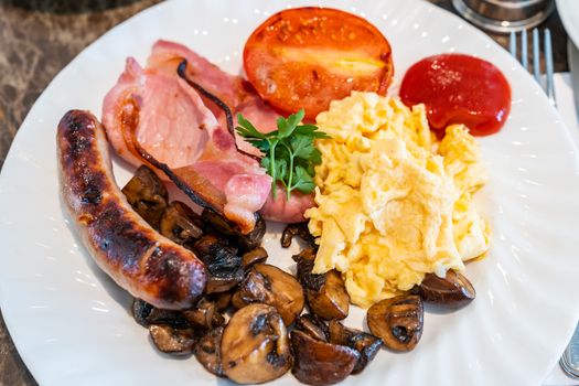Full English Breakfast on Table with coffee