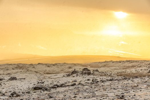 Snowy Winter Mountain range with sun light in Reykjavik Iceland