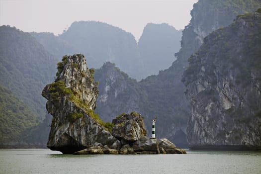 Odd-shaped limestone rock in Ha Long Bay, Vietnam