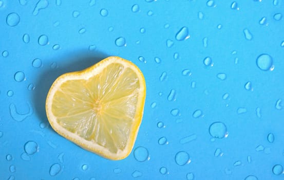 Heart shape of Lemon slice and dew drops