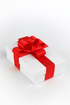 One white gift box with red bow on white background