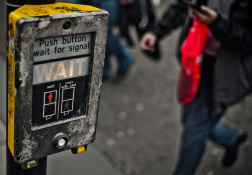 Grungy Urban City Scene Of People Crossing A Street In The UK With Copy Space