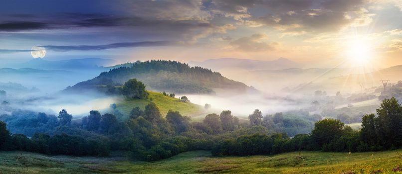 mysterious summer landscape composite image of day and night with cold morning fog on hillside in mountainous rural area