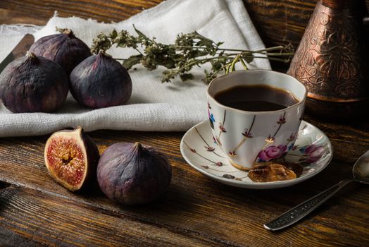 Tasty coffee break with ripe and juicy figs.