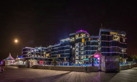 ODESSA, UKRAINE - 08.22.2018. Panoramic view of Langeron city beach in a hot summer night. The most popular beach in Odessa