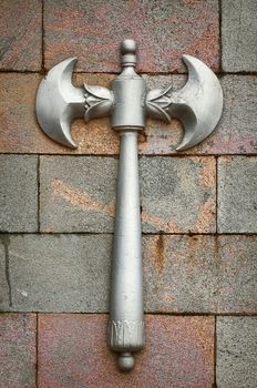 Decorative Element in the Form of an Ax on a Stone Wall