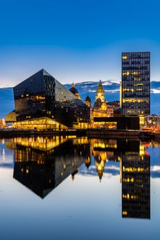 Liverpool Skyline building at Pier head and alber dock at sunset dusk, Liverpool England UK.