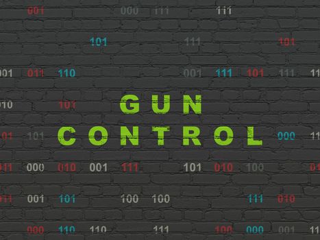 Safety concept: Painted green text Gun Control on Black Brick wall background with Binary Code