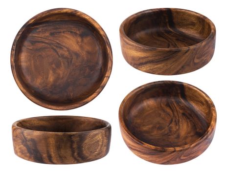 Collection of empty wooden bowls isolated on white background with clipping path.