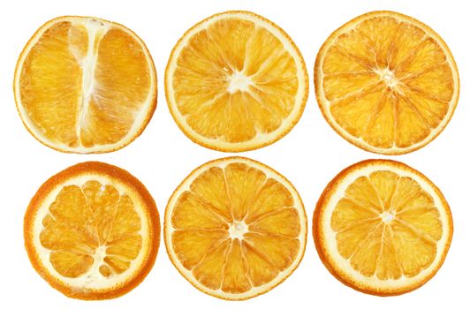 Dried oranges isolated on white background closeup top view